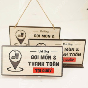 Bảng gỗ để bàn gọi món và thanh toán tại quầy 